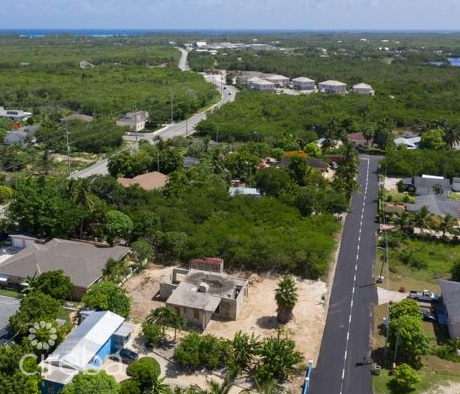 NORTH SIDE DEVELOPMENT LOT WITH PARTIAL CONSTRUCTION & PLANS