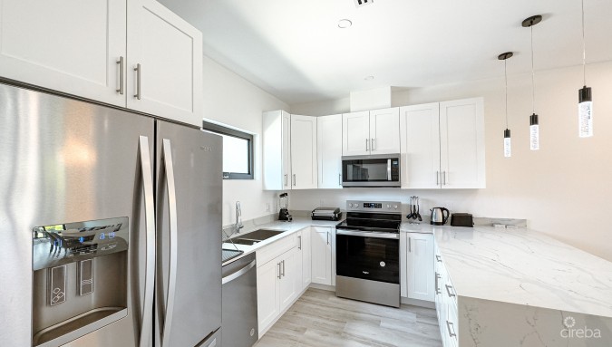THE LAGOONS 2 BED WATERFRONT TOWNHOUSE