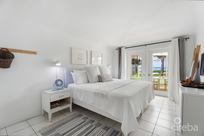 CAYMAN KAI SEA LODGE #13 BEACHFRONT CONDO WITH IMPRESSIVE RENTAL HISTORY