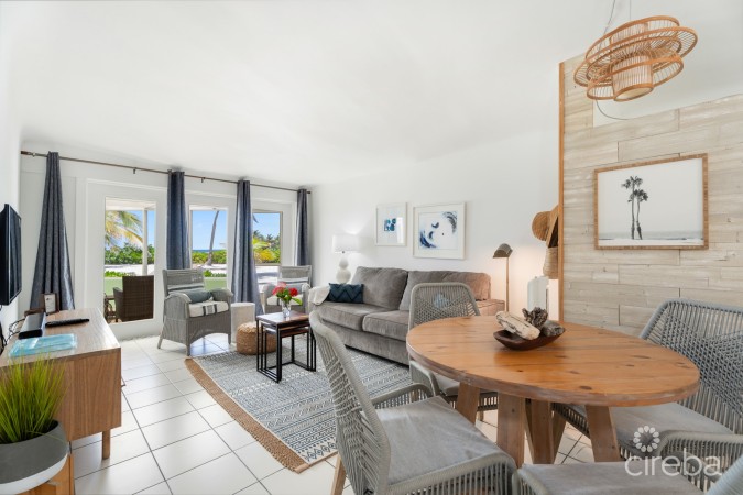 CAYMAN KAI SEA LODGE #13 BEACHFRONT CONDO WITH IMPRESSIVE RENTAL HISTORY