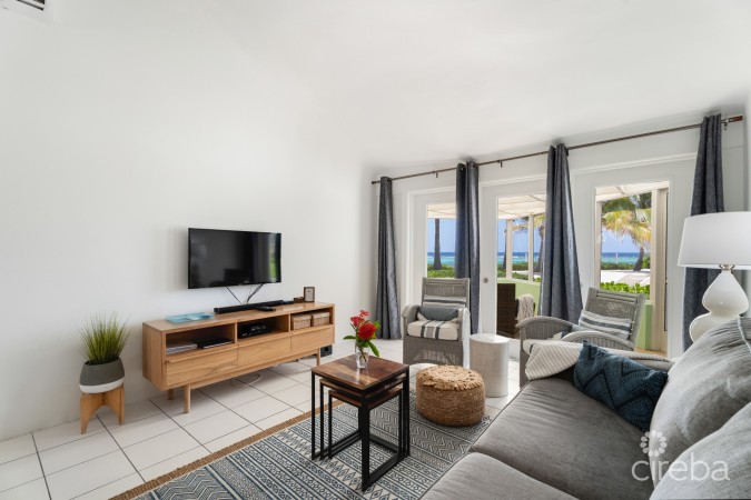 CAYMAN KAI SEA LODGE #13 BEACHFRONT CONDO WITH IMPRESSIVE RENTAL HISTORY