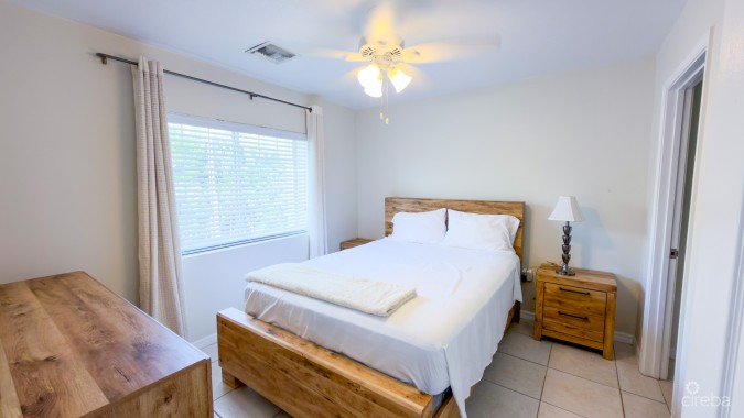 LAKESIDE K36 RENOVATED 2 BEDROOM CONDO OPPOSITE CAMANA BAY