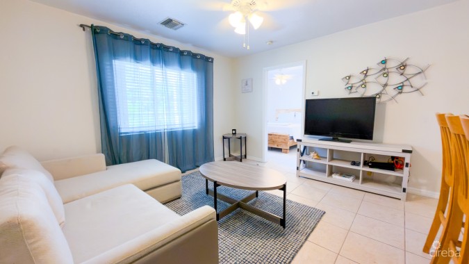 LAKESIDE K36 RENOVATED 2 BEDROOM CONDO OPPOSITE CAMANA BAY