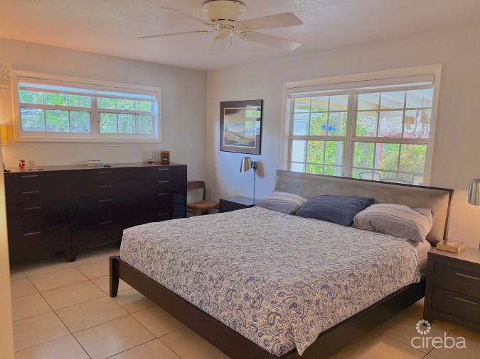 RARE DOUBLE-LOT OASIS BUNGALOW  WITH POOL IN SNUG HARBOUR