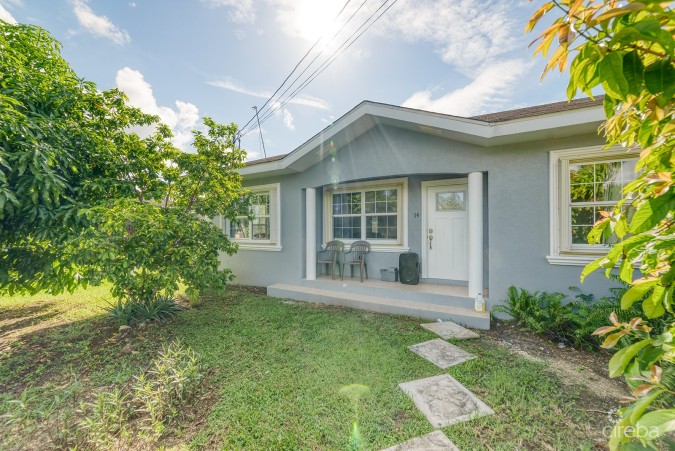 3 BEDROOM HOME ON DUPLEX LOT W/APPROVED PLANS FOR  ADDITIONAL 4-BEDROOM HOME