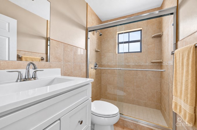 3 BEDROOM HOME ON DUPLEX LOT W/APPROVED PLANS FOR  ADDITIONAL 4-BEDROOM HOME