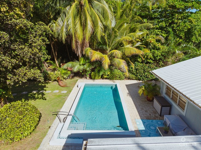RARE DOUBLE-LOT OASIS BUNGALOW  WITH POOL IN SNUG HARBOUR