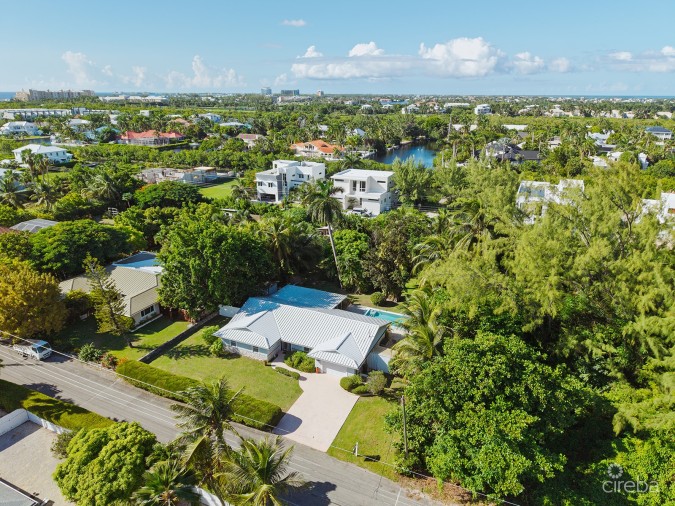 RARE DOUBLE-LOT OASIS BUNGALOW  WITH POOL IN SNUG HARBOUR