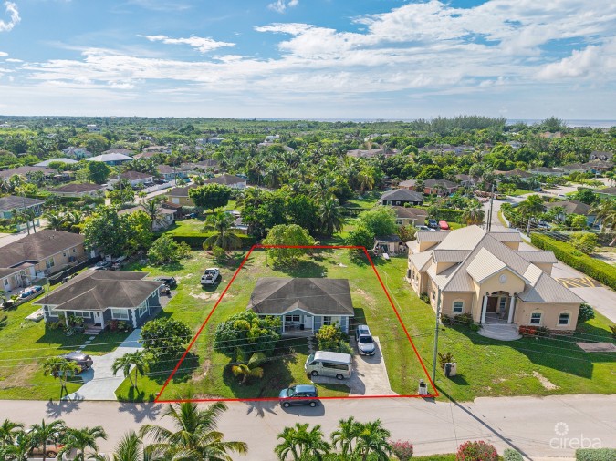 3 BEDROOM HOME ON DUPLEX LOT W/APPROVED PLANS FOR  ADDITIONAL 4-BEDROOM HOME