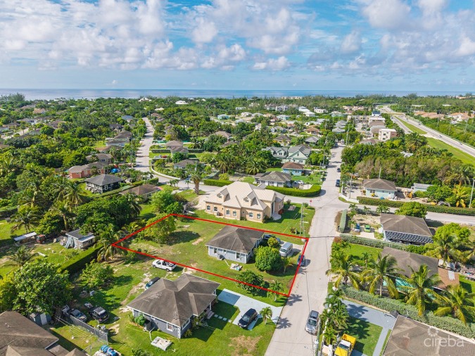 3 BEDROOM HOME ON DUPLEX LOT W/APPROVED PLANS FOR  ADDITIONAL 4-BEDROOM HOME
