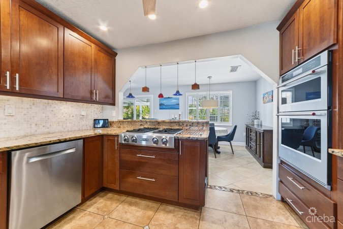 RARE DOUBLE-LOT OASIS BUNGALOW  WITH POOL IN SNUG HARBOUR