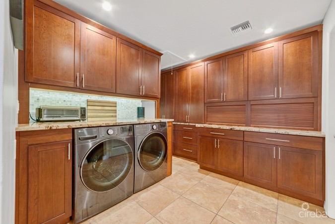 RARE DOUBLE-LOT OASIS BUNGALOW  WITH POOL IN SNUG HARBOUR