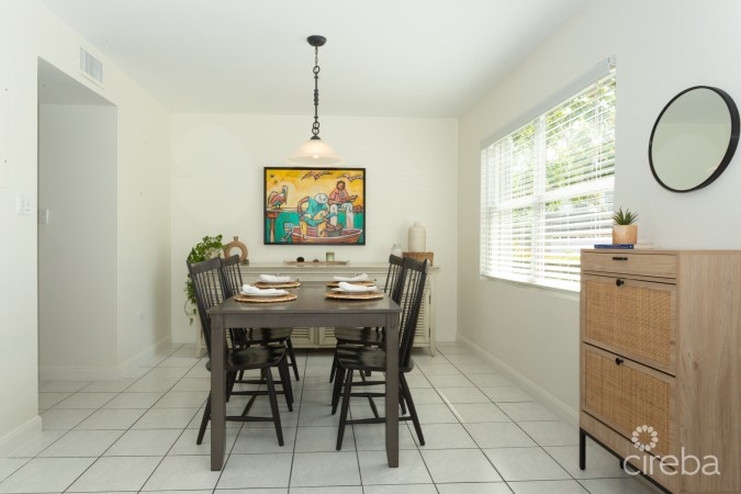 TURNKEY 2BED PLUS DEN END UNIT TROPICAL HAVEN