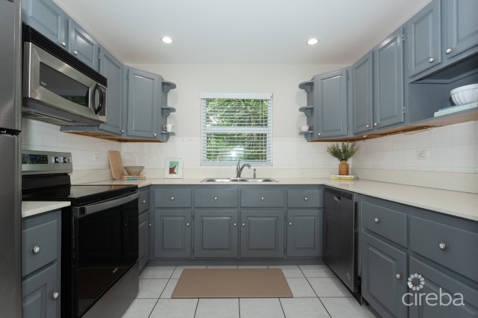 TURNKEY 2BED PLUS DEN END UNIT TROPICAL HAVEN
