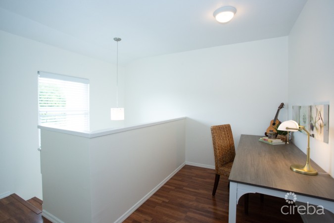 TURNKEY 2BED PLUS DEN END UNIT TROPICAL HAVEN