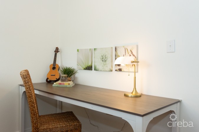 TURNKEY 2BED PLUS DEN END UNIT TROPICAL HAVEN