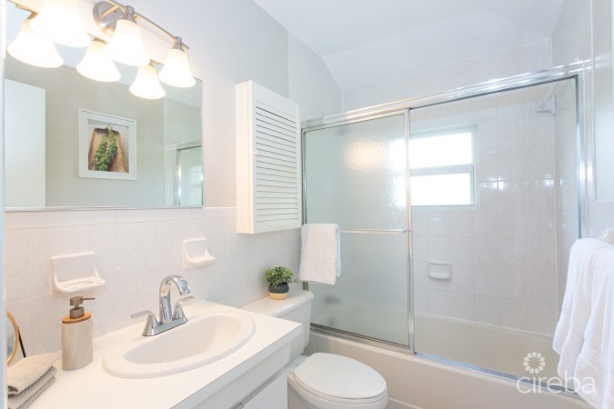 TURNKEY 2BED PLUS DEN END UNIT TROPICAL HAVEN